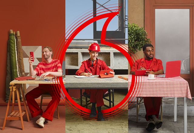A male artist on a smartphone, a female contruction worker on a tablet, and a male office worker on a laptop