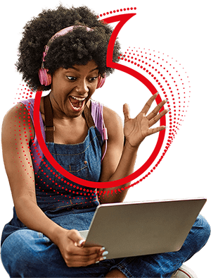Woman using Vodafone Fibre Broadband on laptop