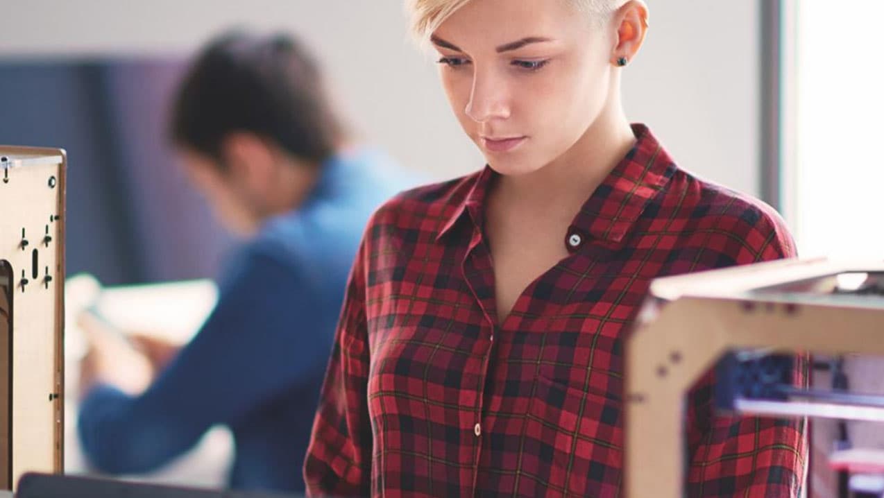 A young woman working in a lab.