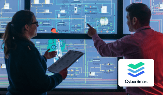 CyberSmart Co workers looking at chip map