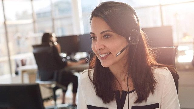 Still have questions? No problem! Woman in call centre