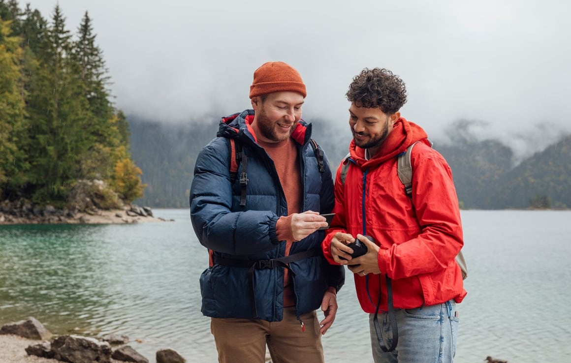 Two men at a lake